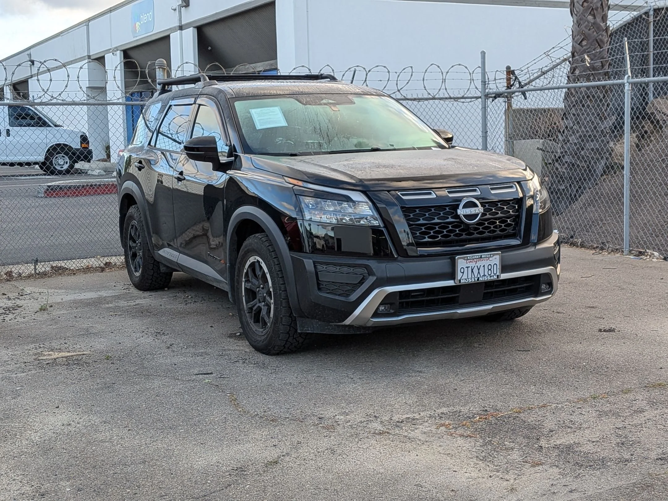 Used 2025 Super Black Nissan Rock Creek image 2