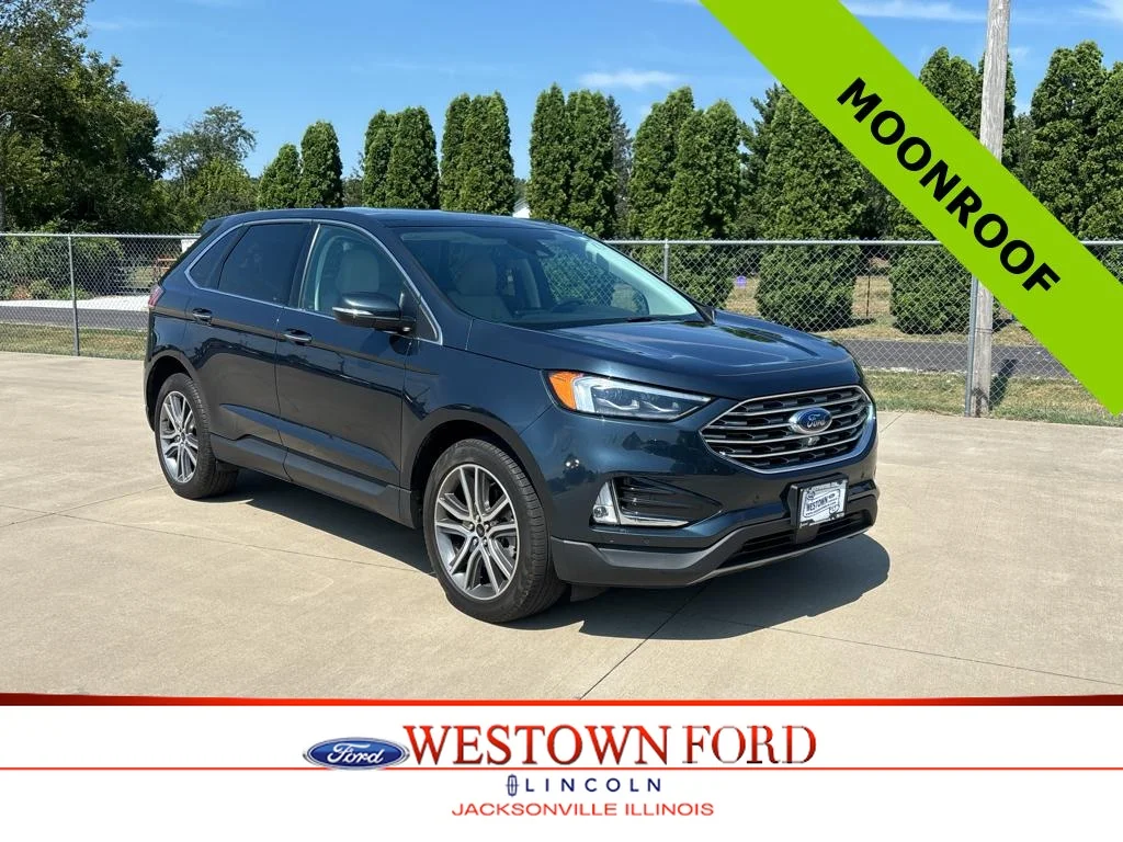 Used 2024 Stone Blue Metallic Ford Titanium image 1