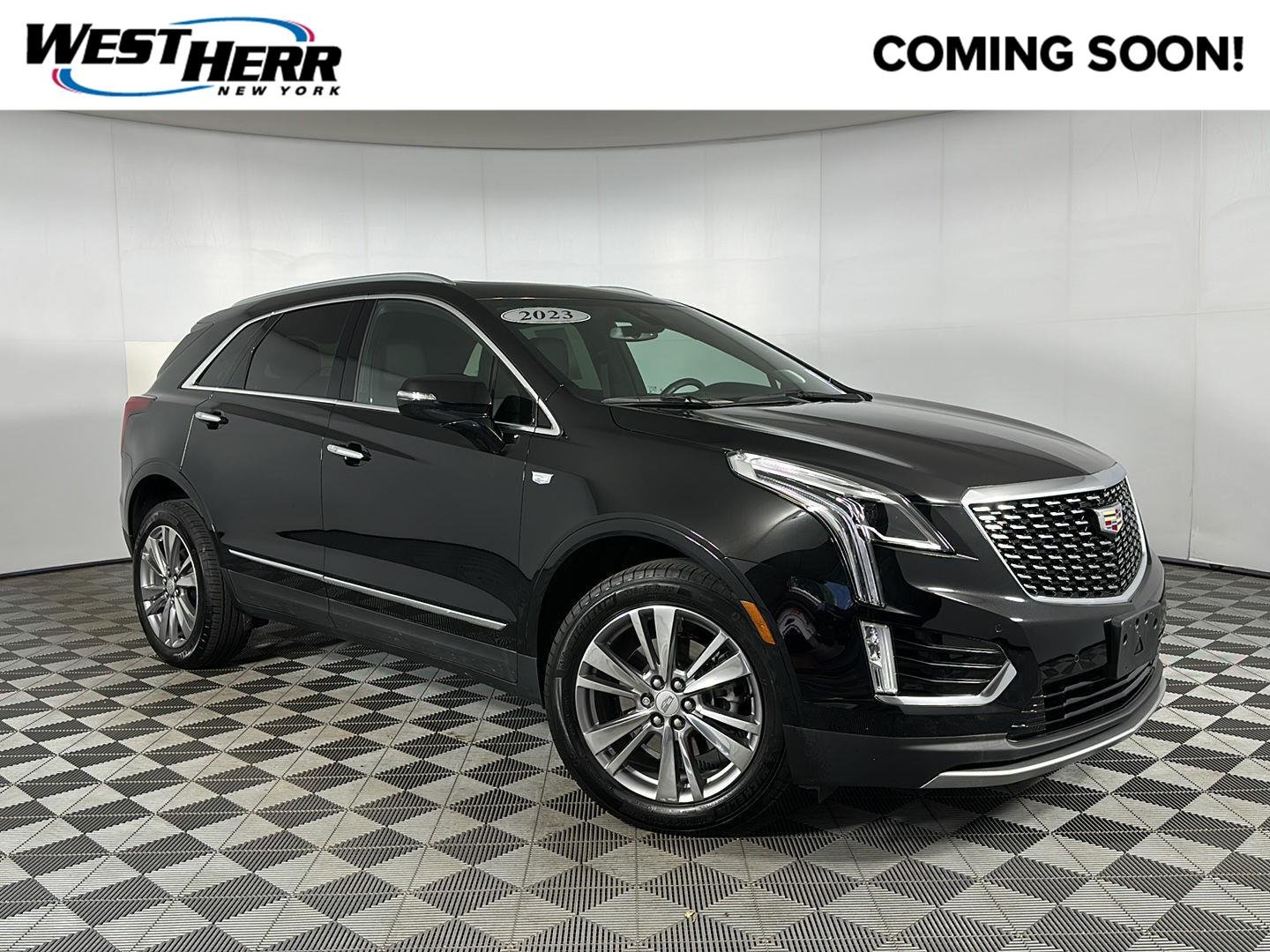 Used 2023 Stellar Black Metallic Cadillac AWD Premium Luxury image 1