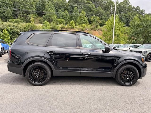 Used 2024 Black Kia EX X-Line image 16