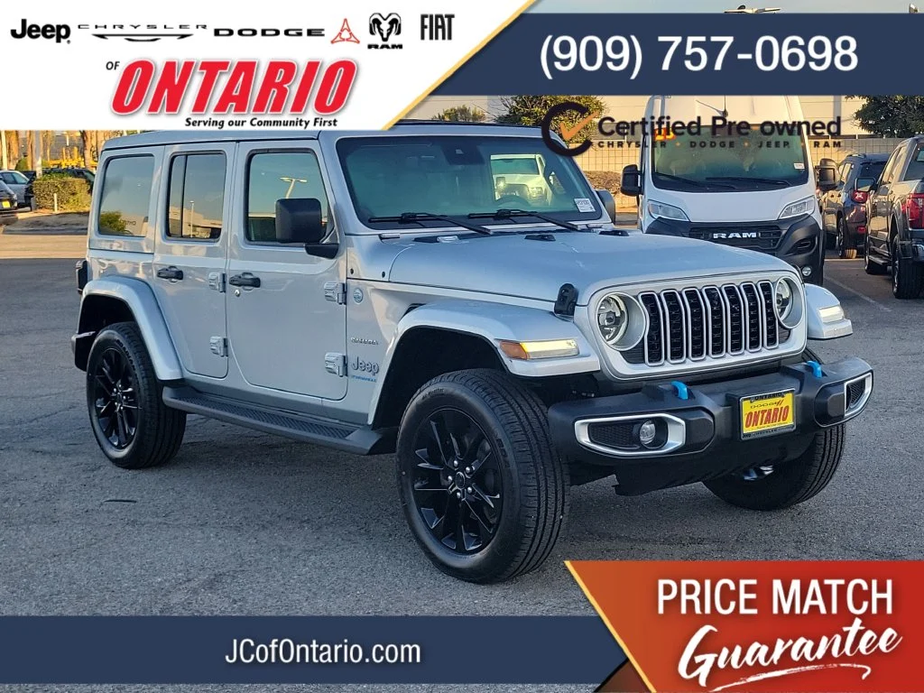 Certified Used 2024 Silver Jeep Sahara 4xe image 1