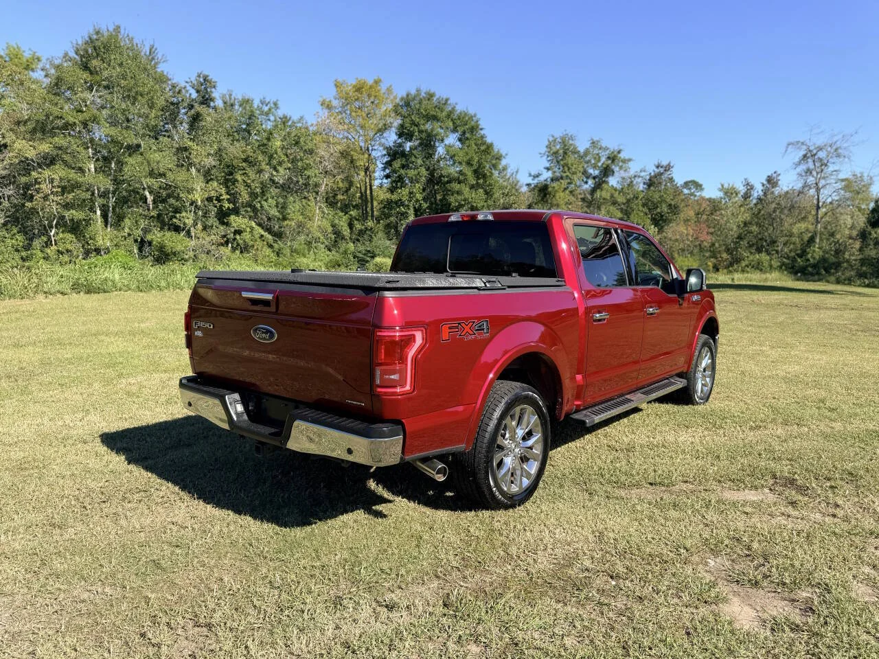 Used 2016 Red Ford Lariat 4x4 4dr SuperCrew 5.5 ft. SB image 5
