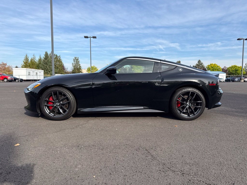 Used 2024 Black Diamond Pearl Nissan Performance image 4