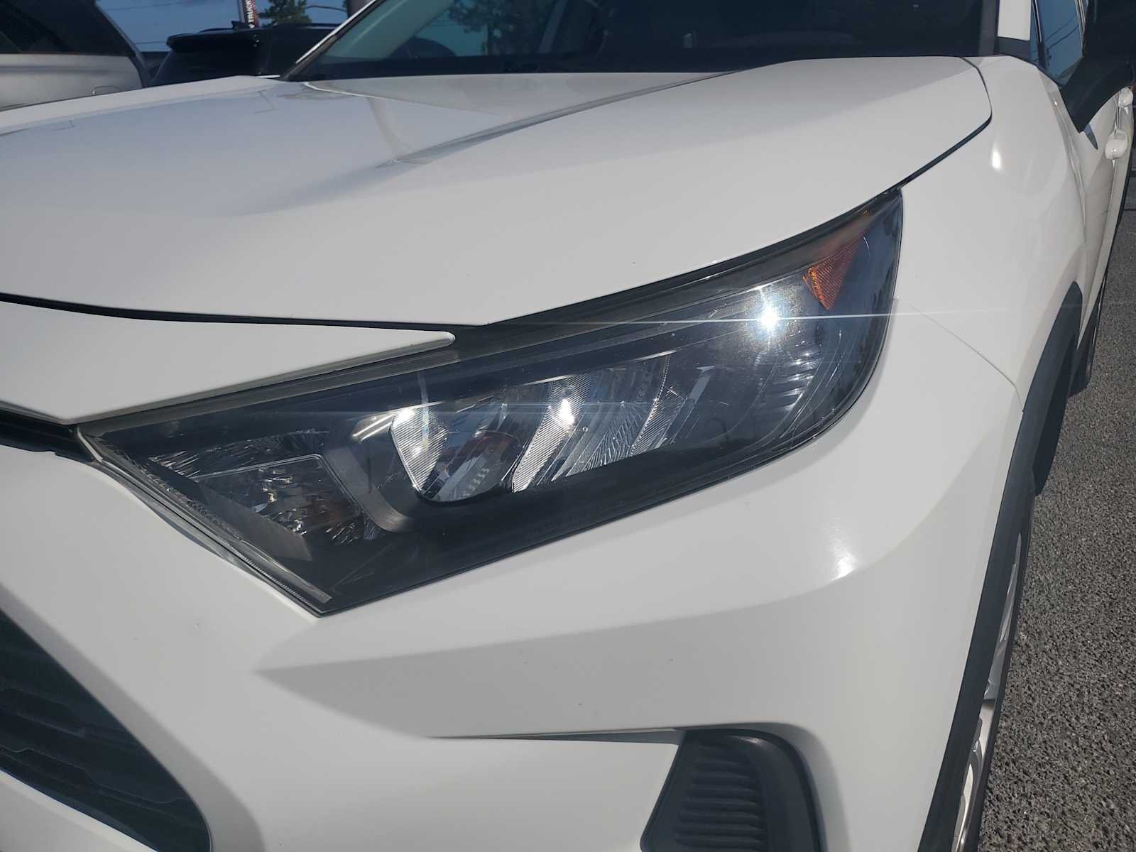 Used 2019 Super White White Toyota LE image 11