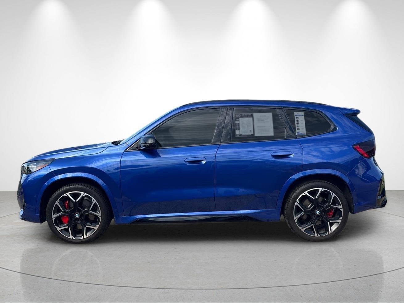 Used 2025 Portimao Blue Metallic BMW M35i image 2