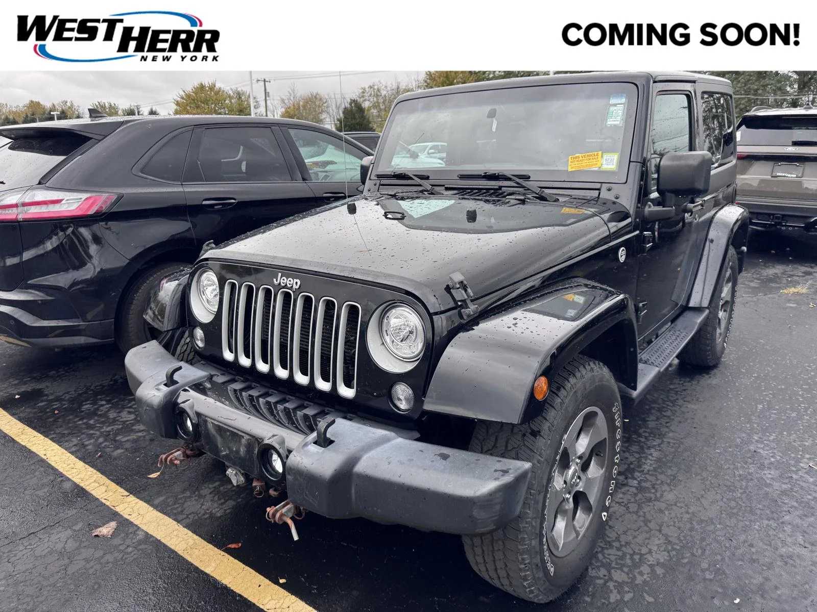 Used 2018 Black Clearcoat Jeep Sahara image 1