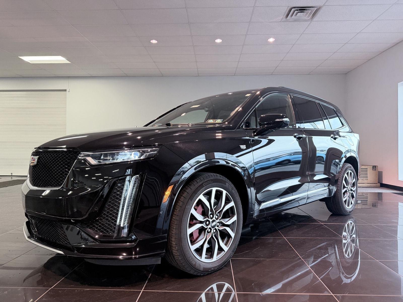 Used 2024 Stellar Black Metallic Cadillac Sport image 3