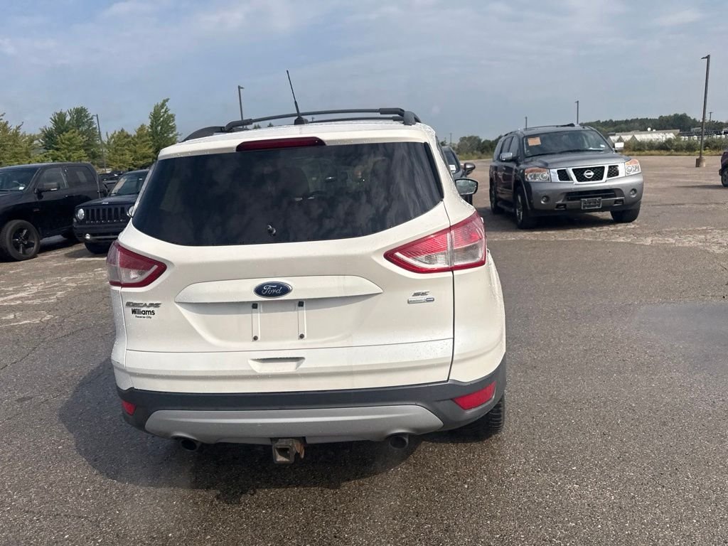 Used 2013 White Platinum Ford SE image 16