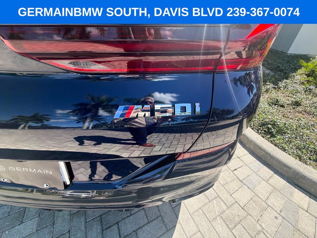 Certified Used 2024 Tanzanite Blue II Metallic BMW M60i image 15