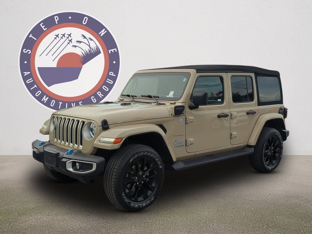 Used 2022 Beige Jeep Unlimited Sahara 4xe image 1
