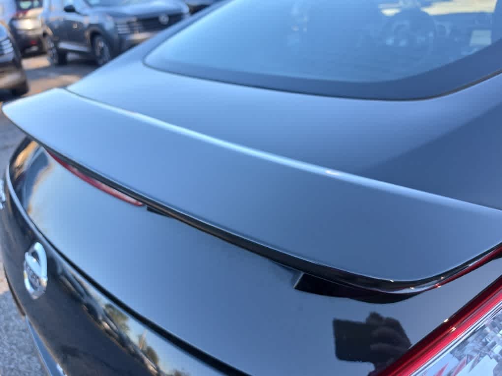 Used 2016 Magnetic Black Nissan Sport Tech image 15