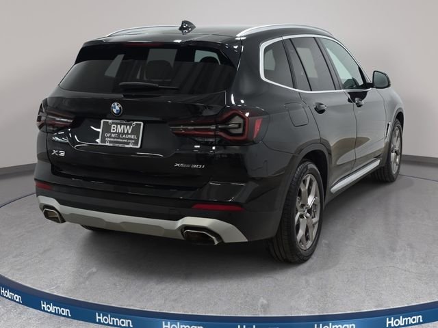 Used 2022 Black Sapphire Metallic BMW xDrive30i image 6