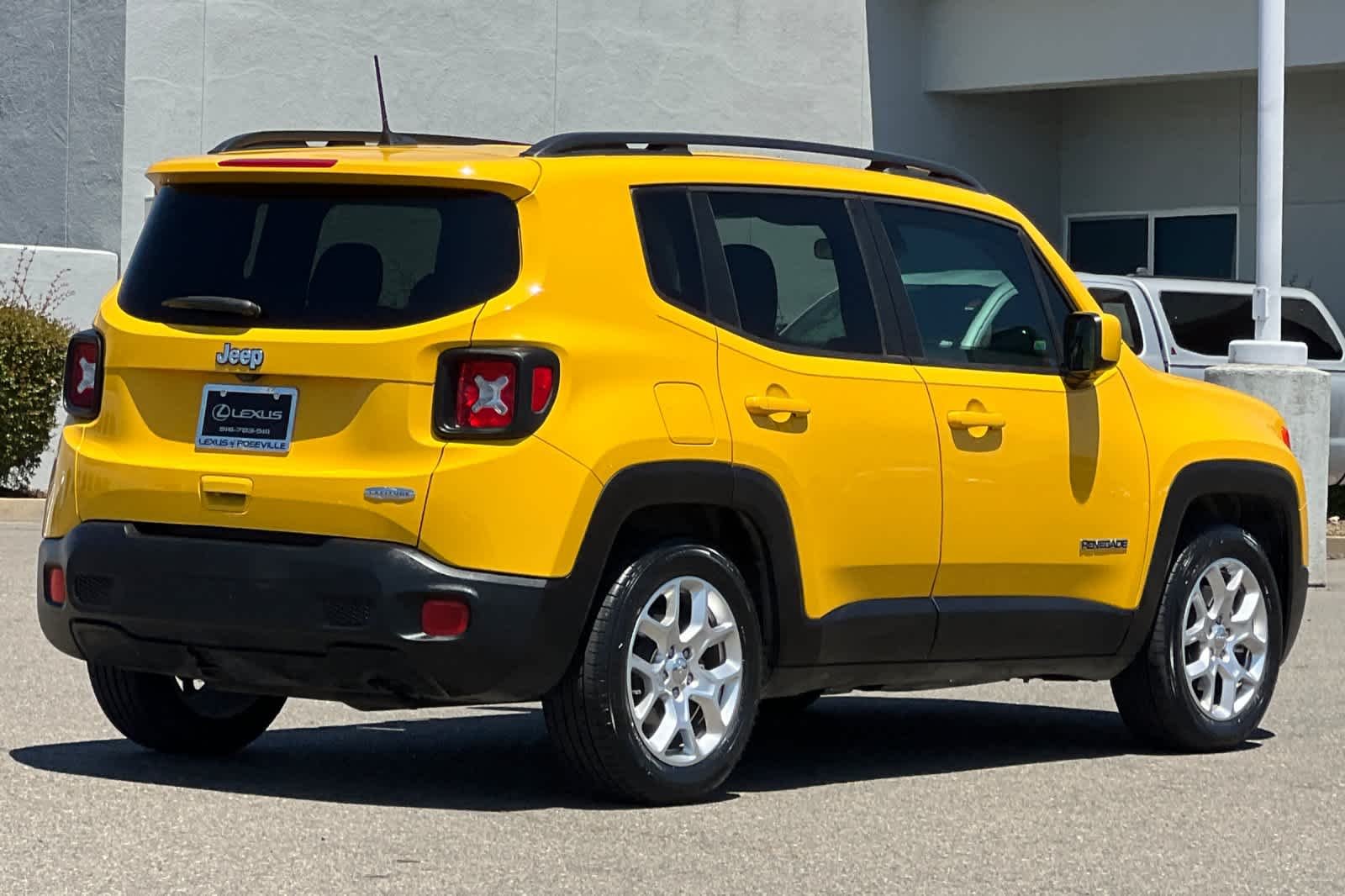 Used 2018 Solar Yellow Jeep Latitude image 2