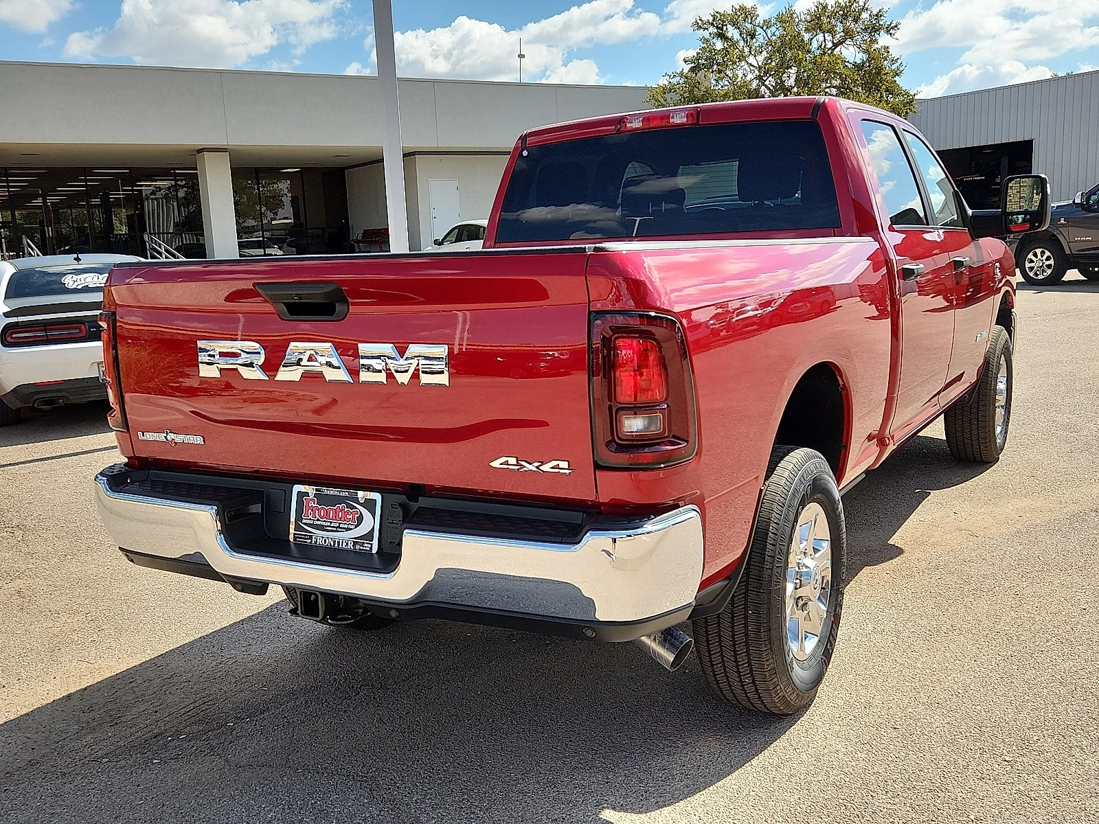 New 2026 Molten Red Pearl-Coat  Paint Ram LONE STAR CREW CAB 4X4 6