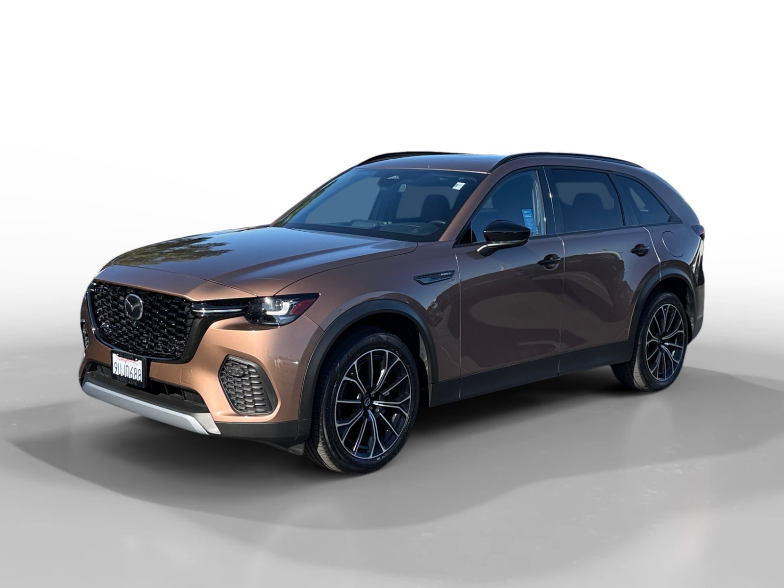 Used 2025 Copper Metallic Mazda Premium Plus image 1