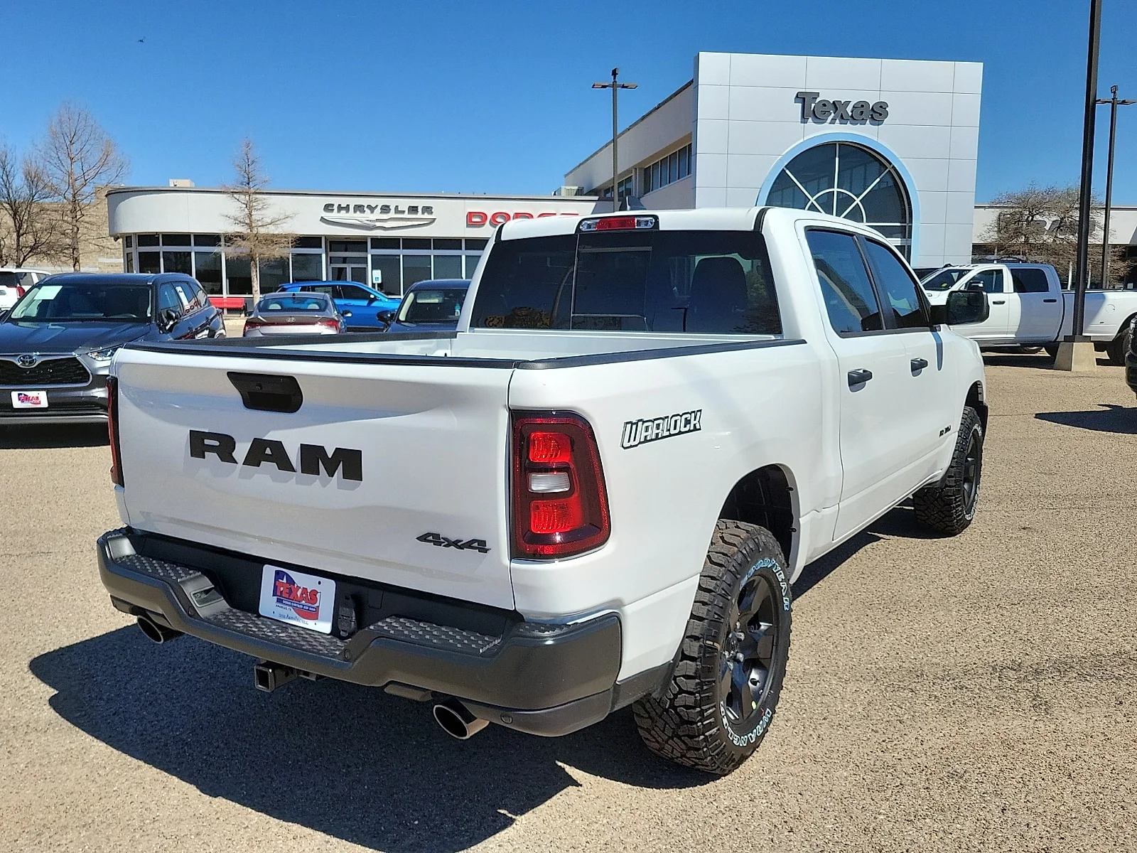 New 2026 PW7 Bright Whit Ram WARLOCK CREW CAB 4X4 5