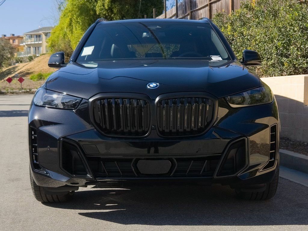 New 2026 Black Sapphire Metallic BMW xDrive50e image 3