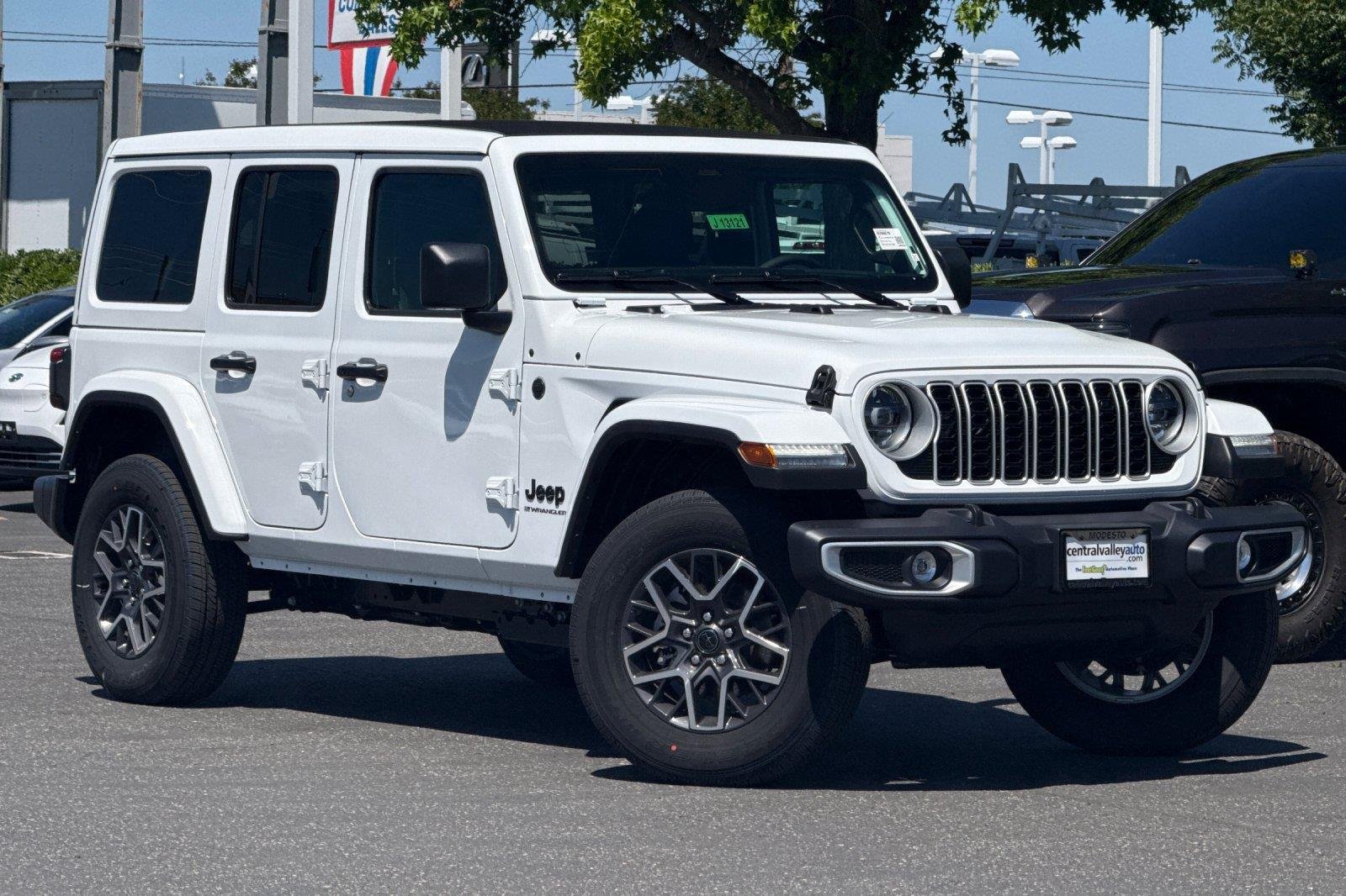 New 2026 Bright White Clearcoat Jeep Sahara image 1