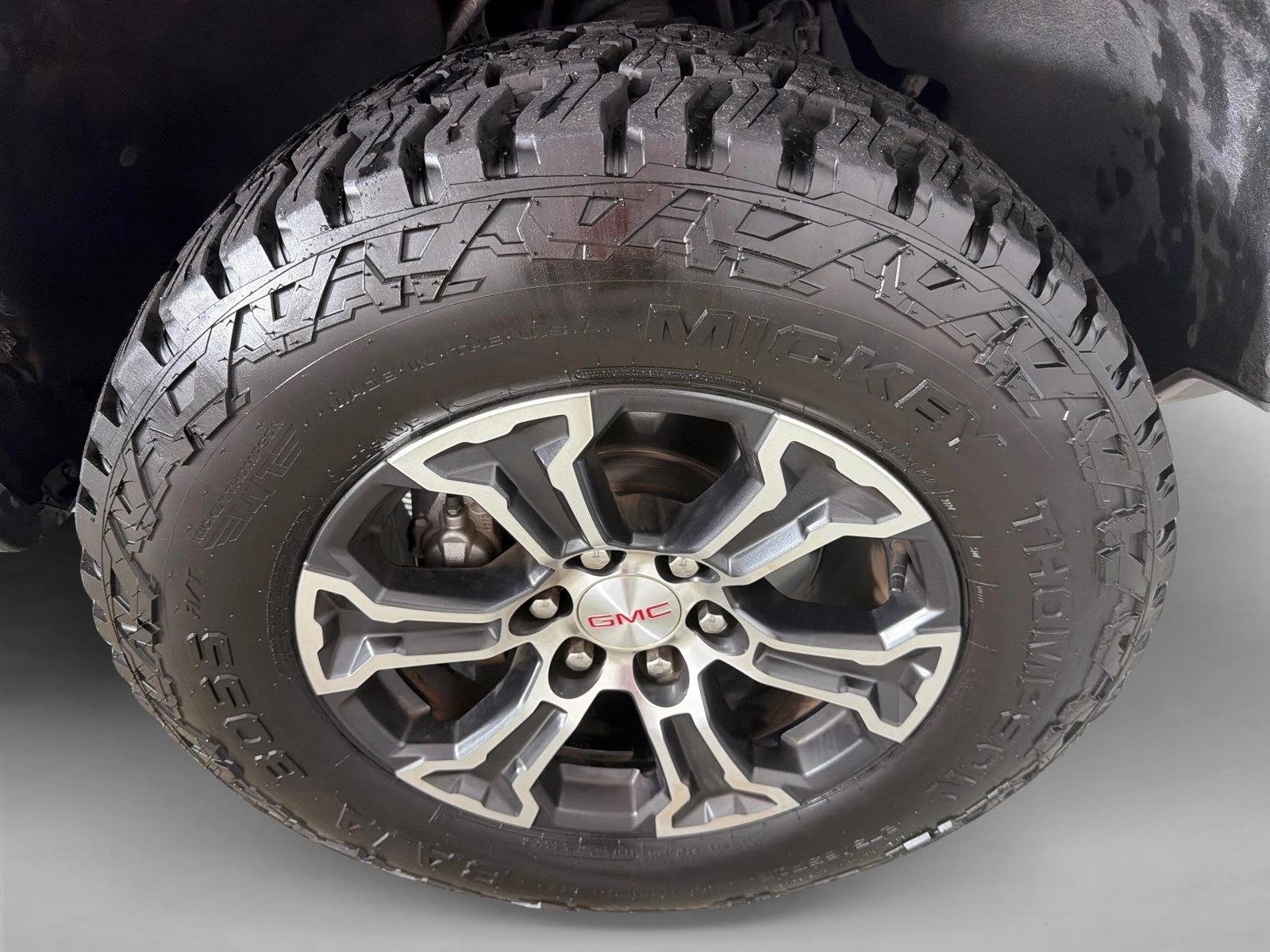 Used 2024 Sterling Metallic GMC 4WD AT4 image 12