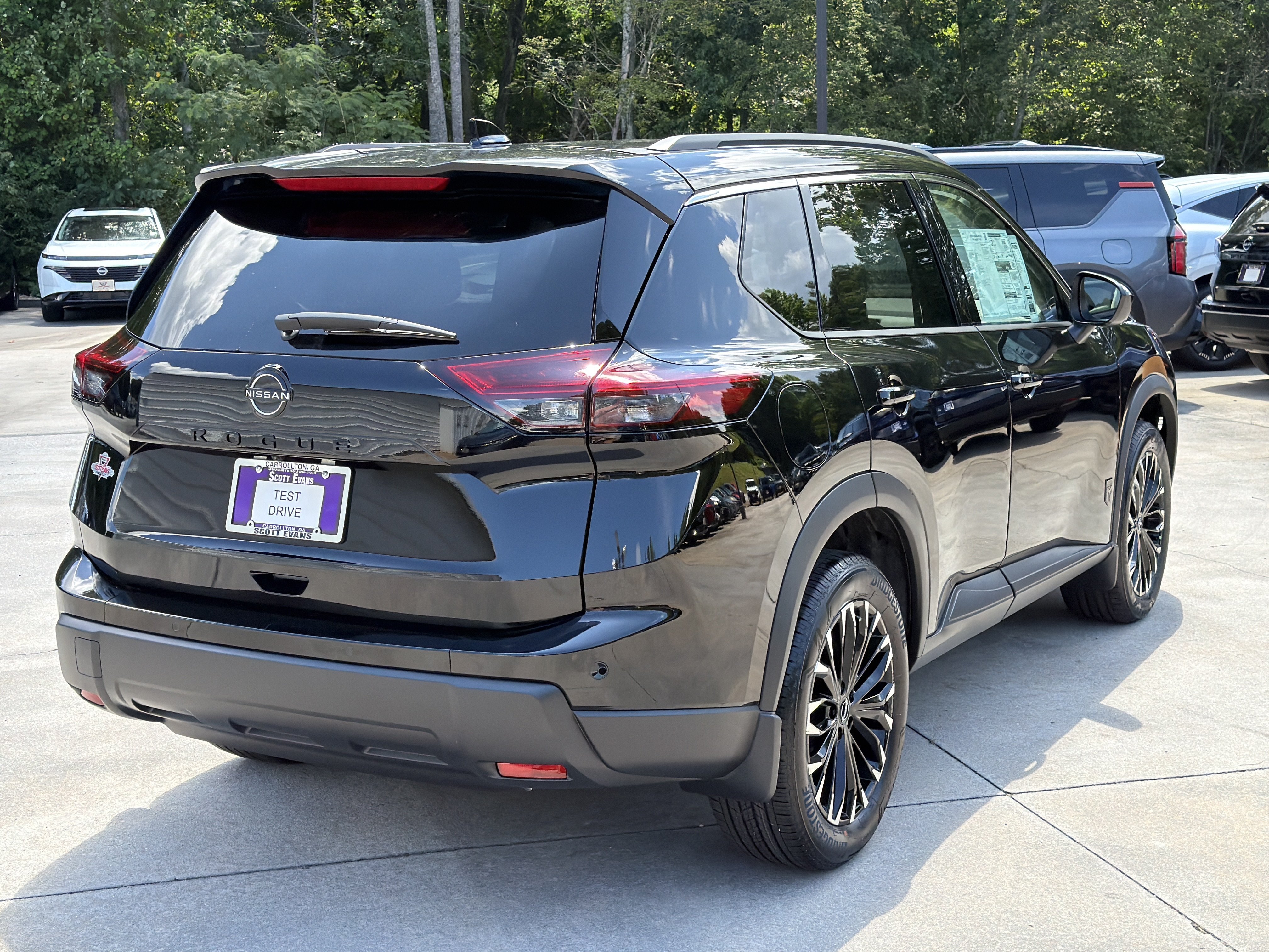 New 2026 Super Black Nissan Dark Armor image 8