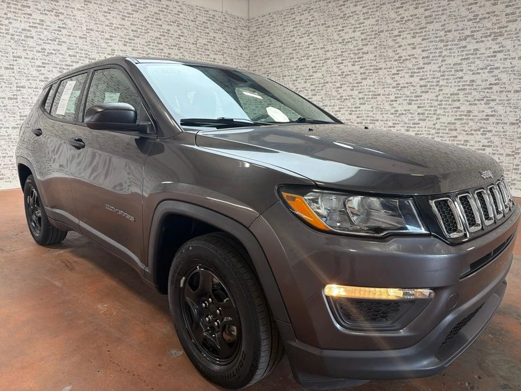 Used 2020 Granite Crystal Metallic Clearcoat Jeep Sport image 1