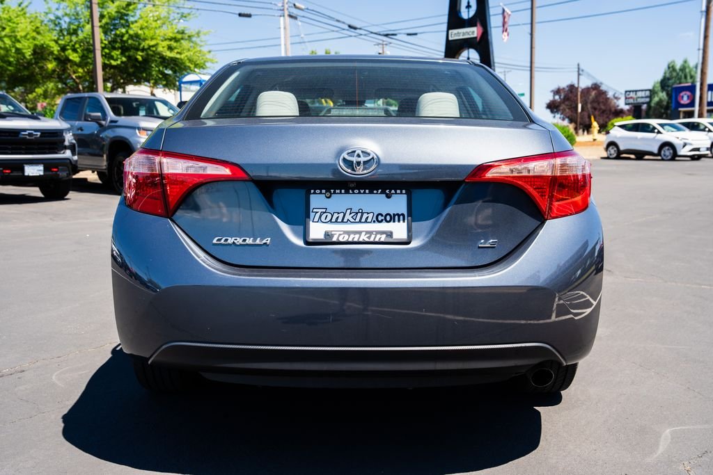 Used 2019 Slate Metallic Toyota LE image 4