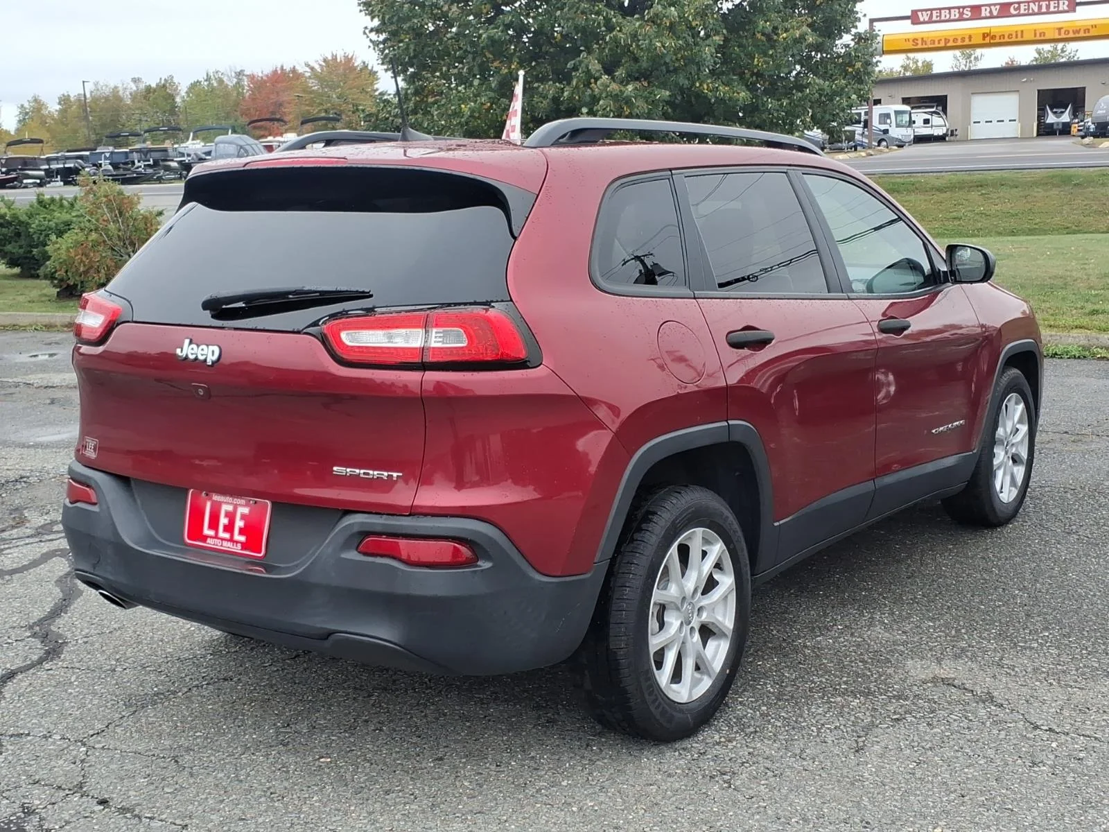 Used 2017 Deep Cherry Red Crystal Jeep Sport image 5