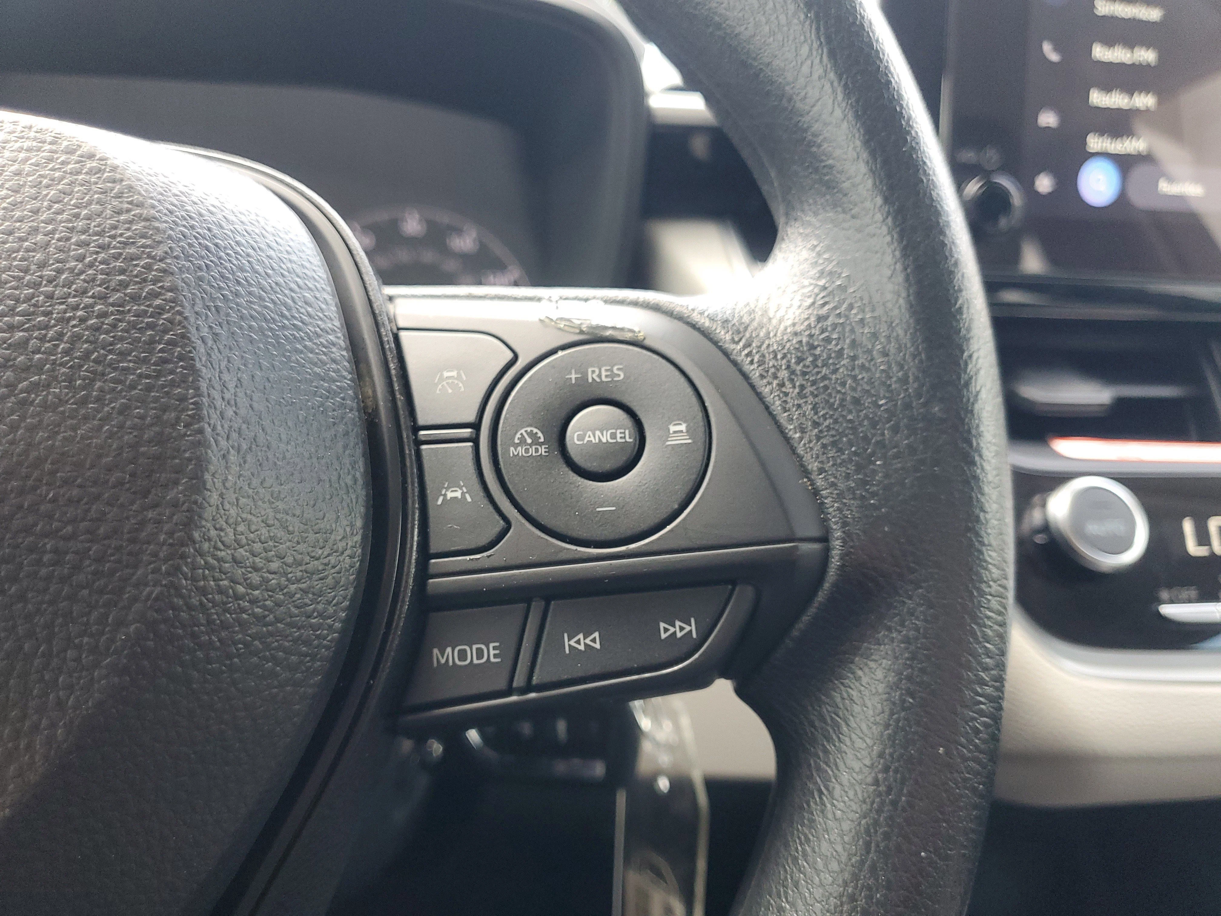 Used 2025 Midnight Black Metallic Toyota LE image 21