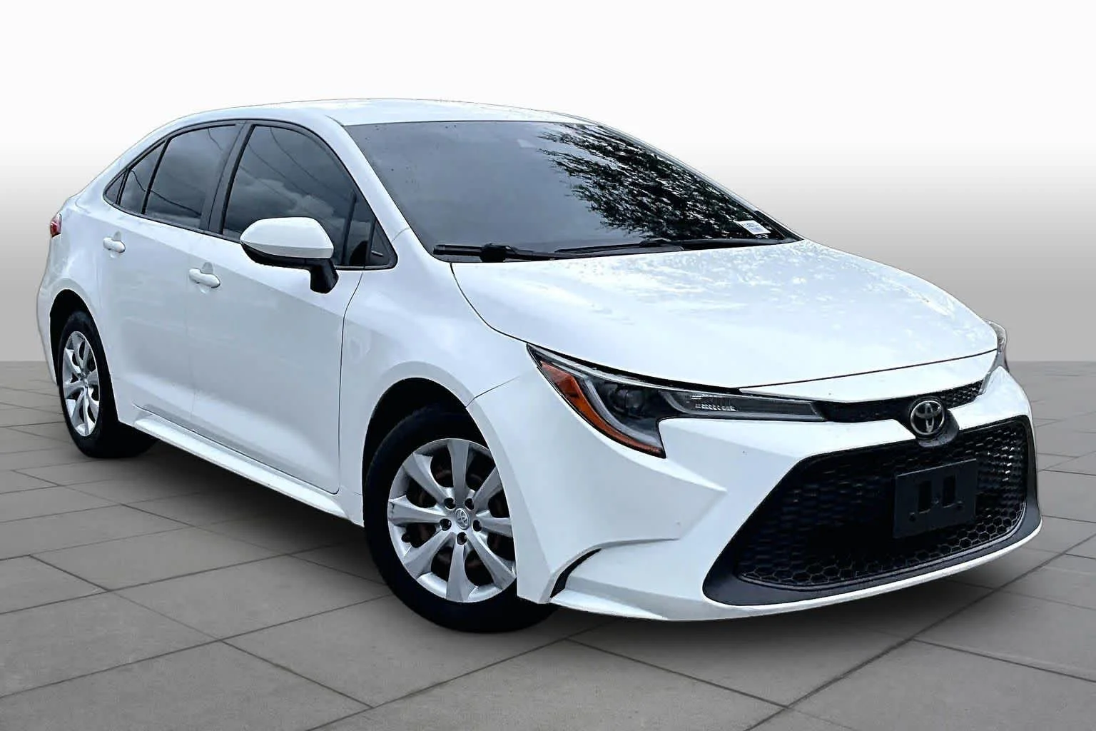 Used 2021 Super White Toyota LE image 3