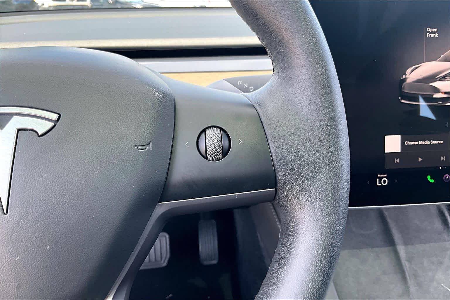 Used 2023 Solid Black Tesla  image 21