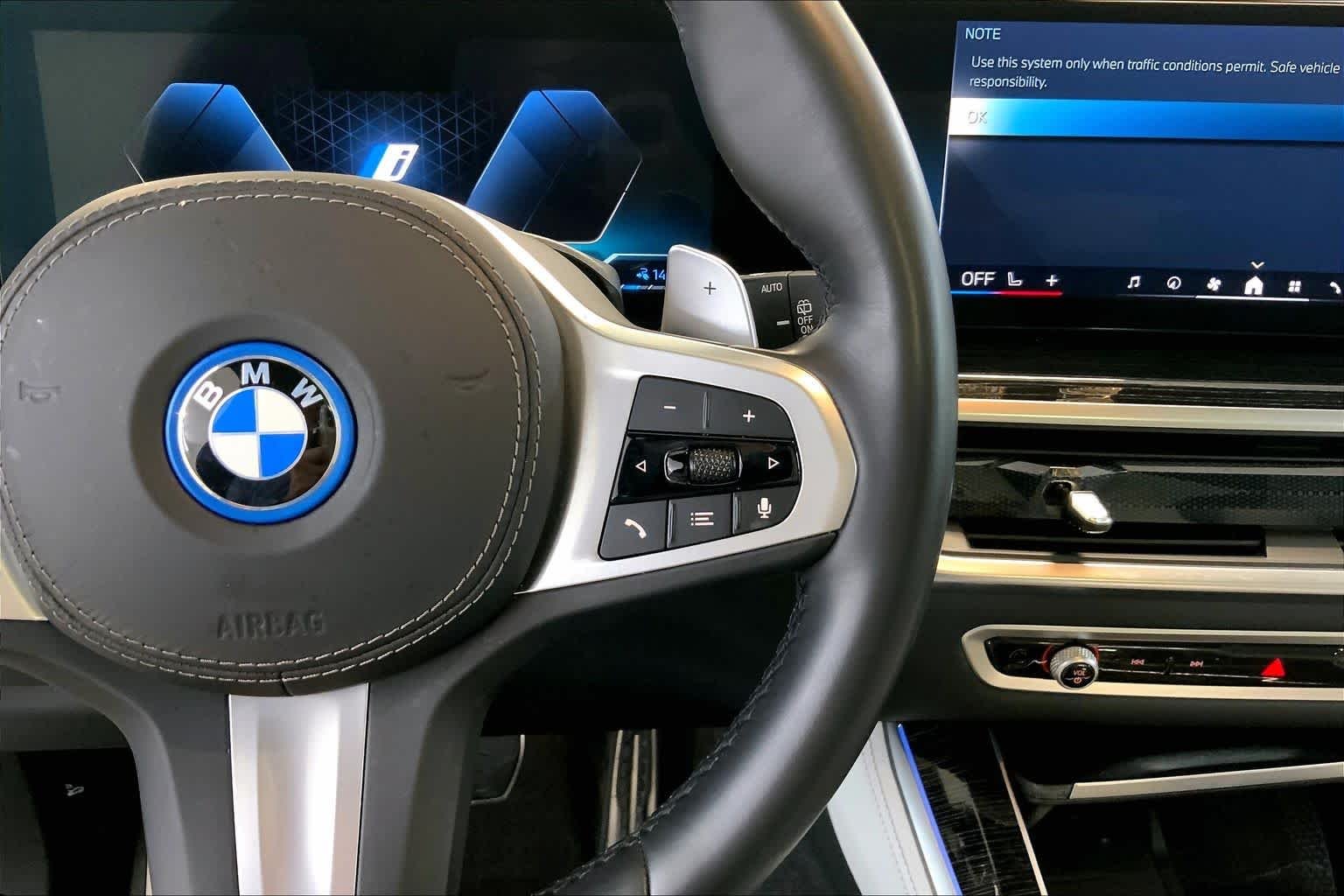 Used 2024 Mineral White Metallic BMW xDrive50e image 24