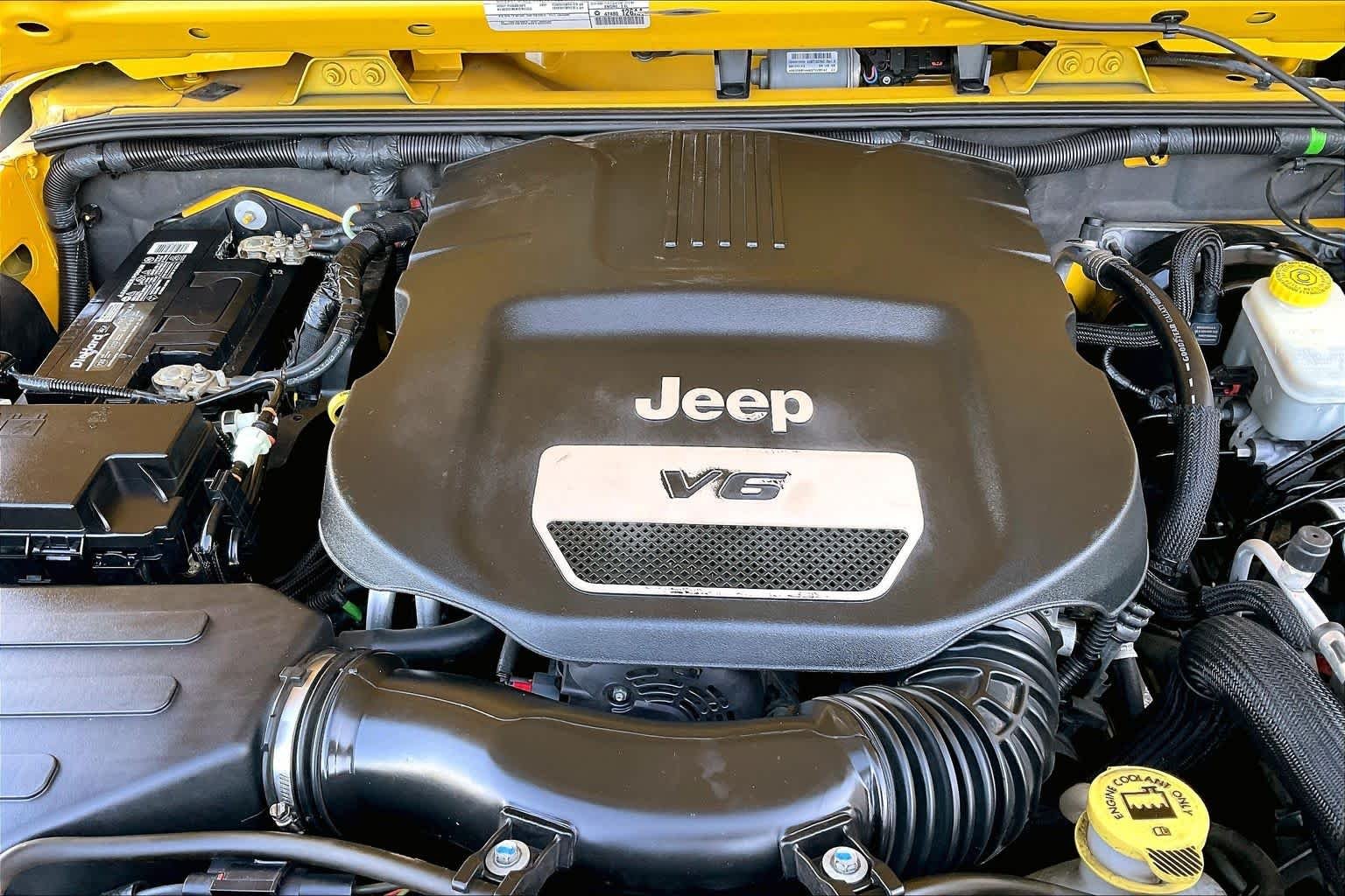 Used 2015 Baja Yellow Clearcoat Jeep Sport image 28