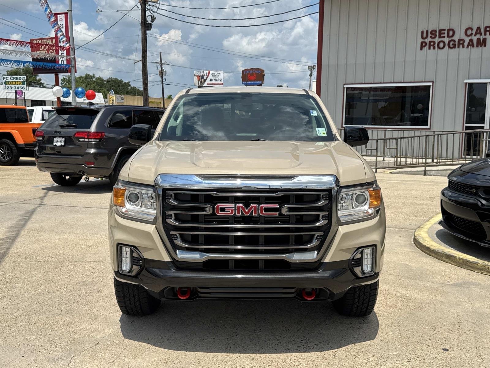 Used 2022 Desert Sand Metallic GMC 4WD AT4 w/Cloth image 2