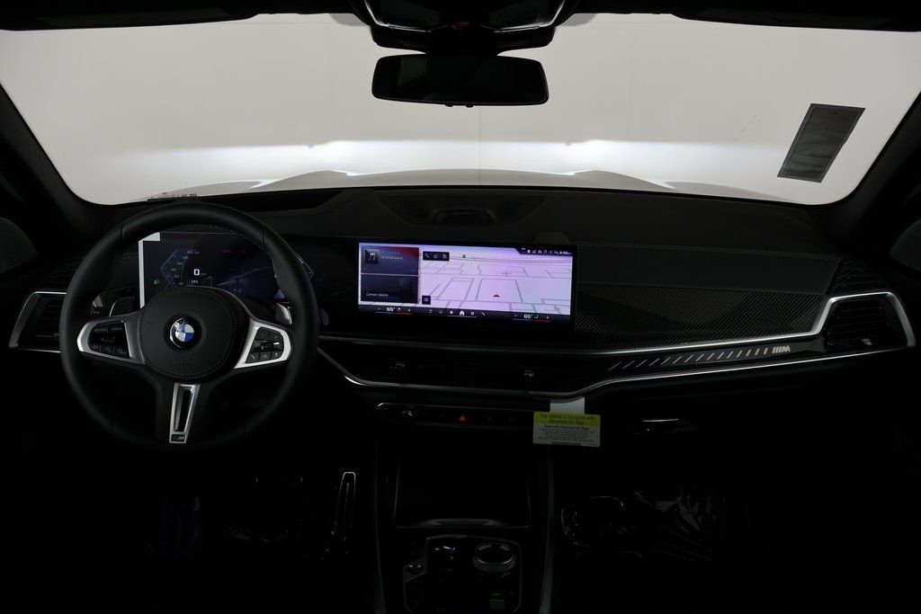 New 2026 Black Sapphire Metallic BMW M60i image 4