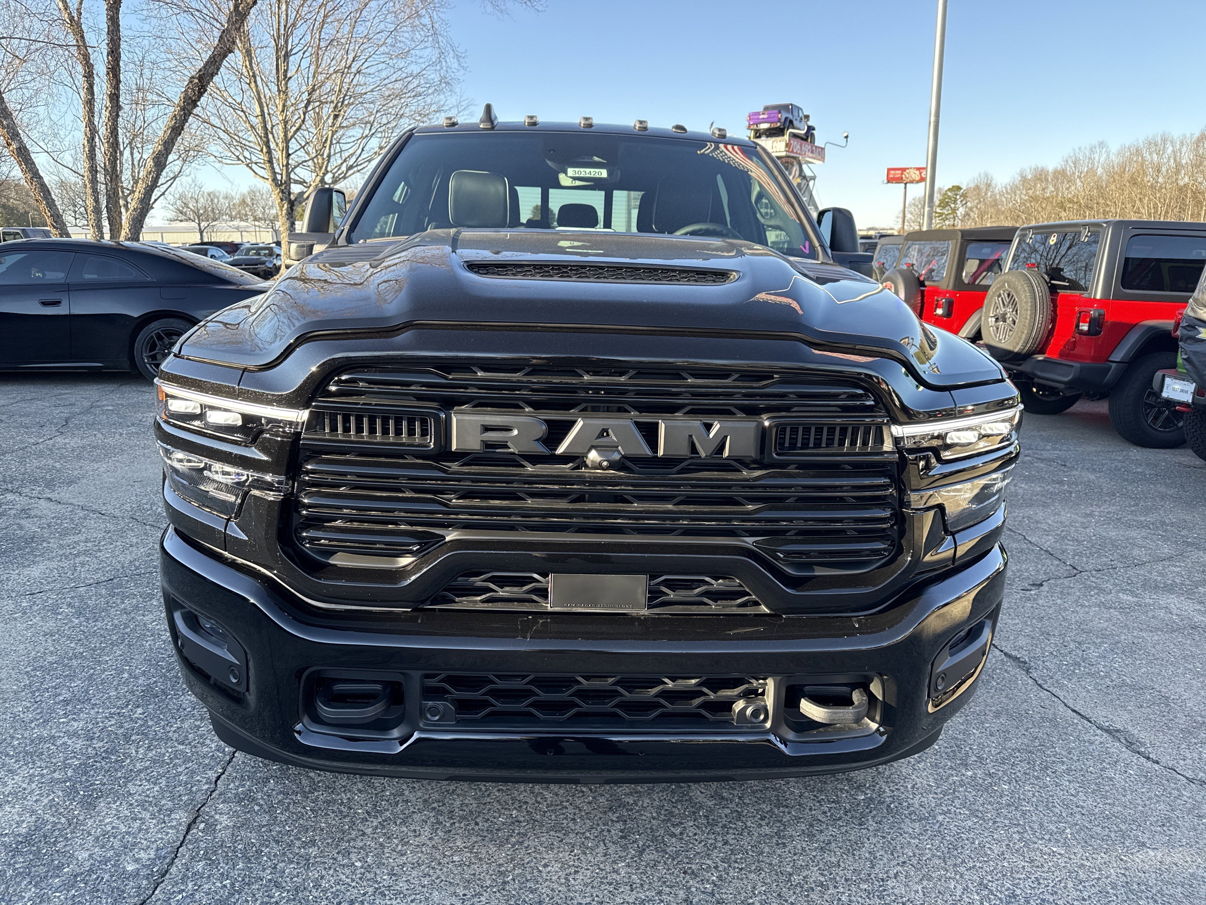 New 2026 Diamond Black Crystal Pearlcoat RAM Laramie image 2