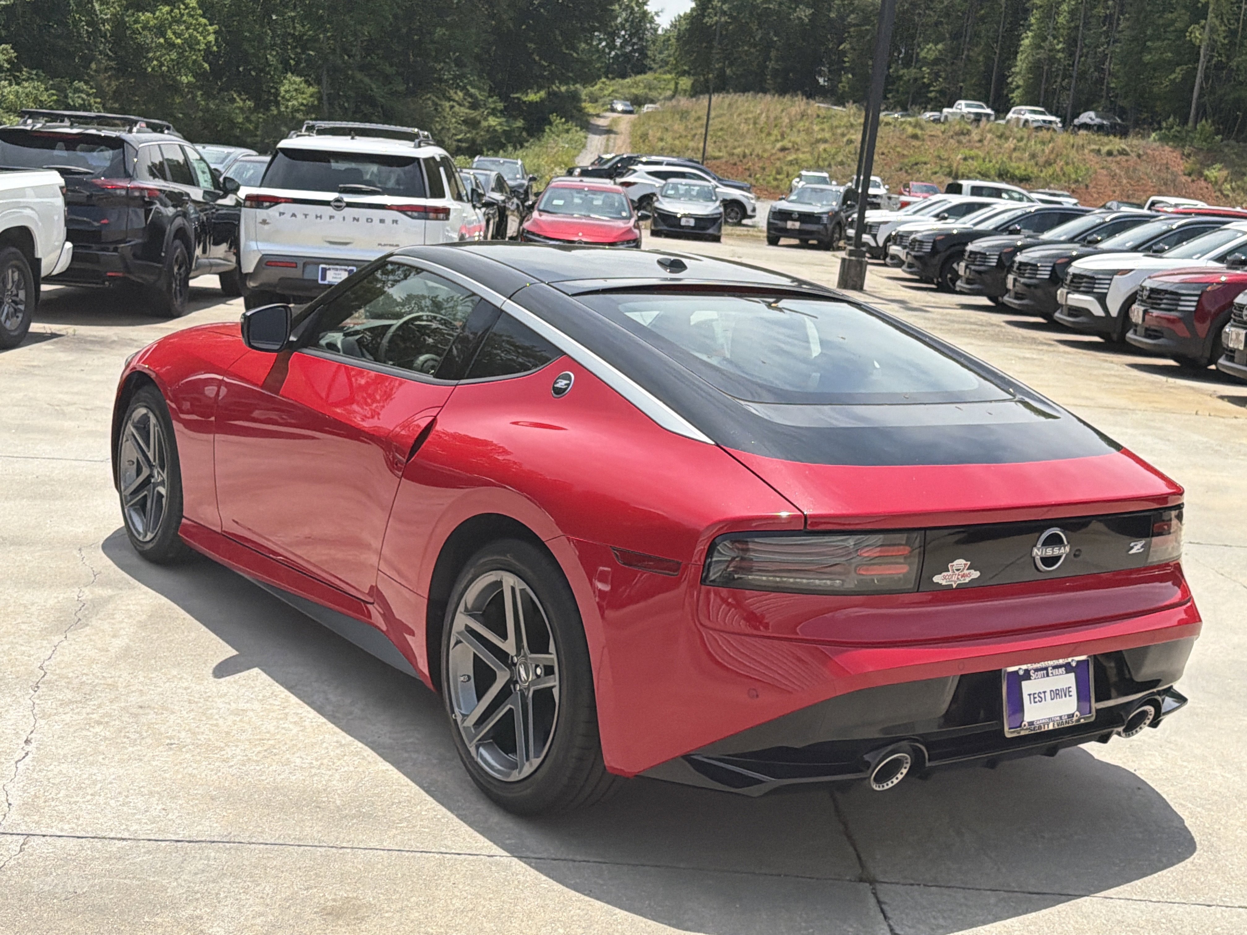 New 2026 Solid Red/Super Black Nissan Sport image 6