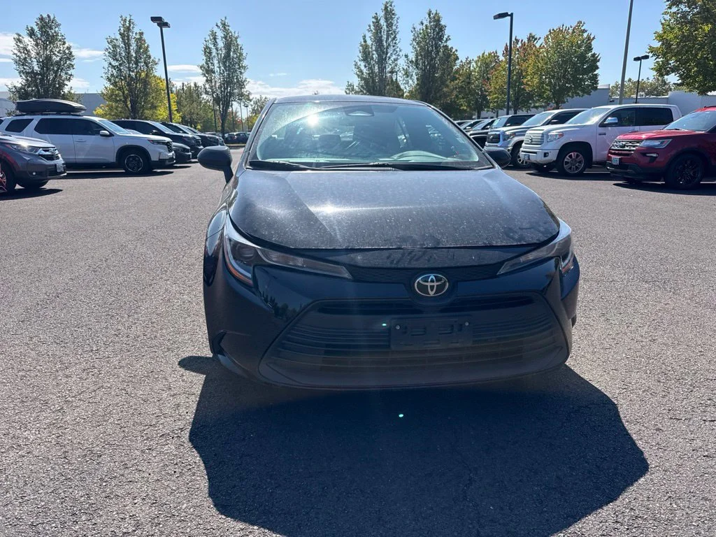 Used 2024 Midnight Black Metallic Toyota LE image 2