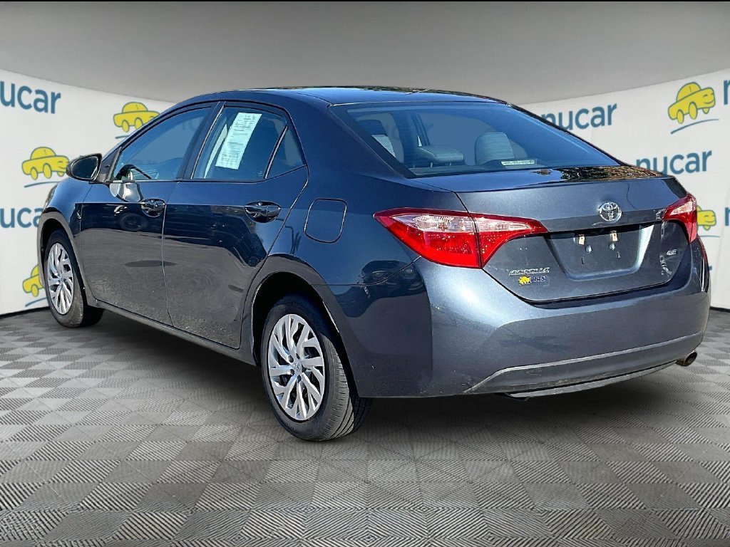 Used 2019 Slate Metallic Toyota LE image 4