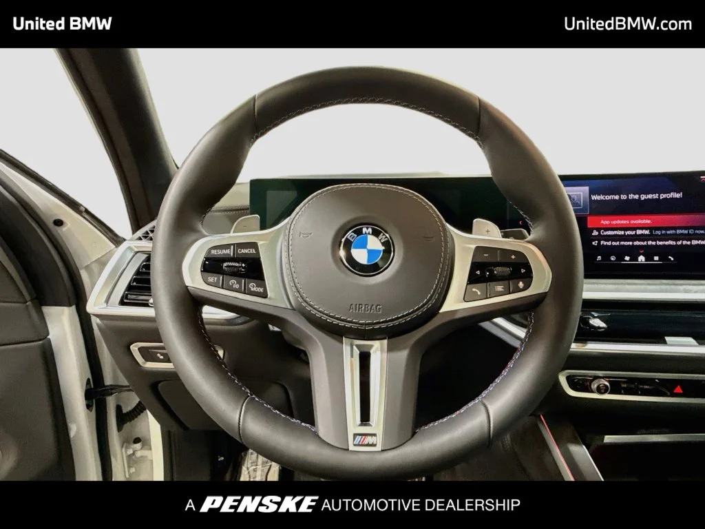 New 2026 White Metallic BMW M60i image 13