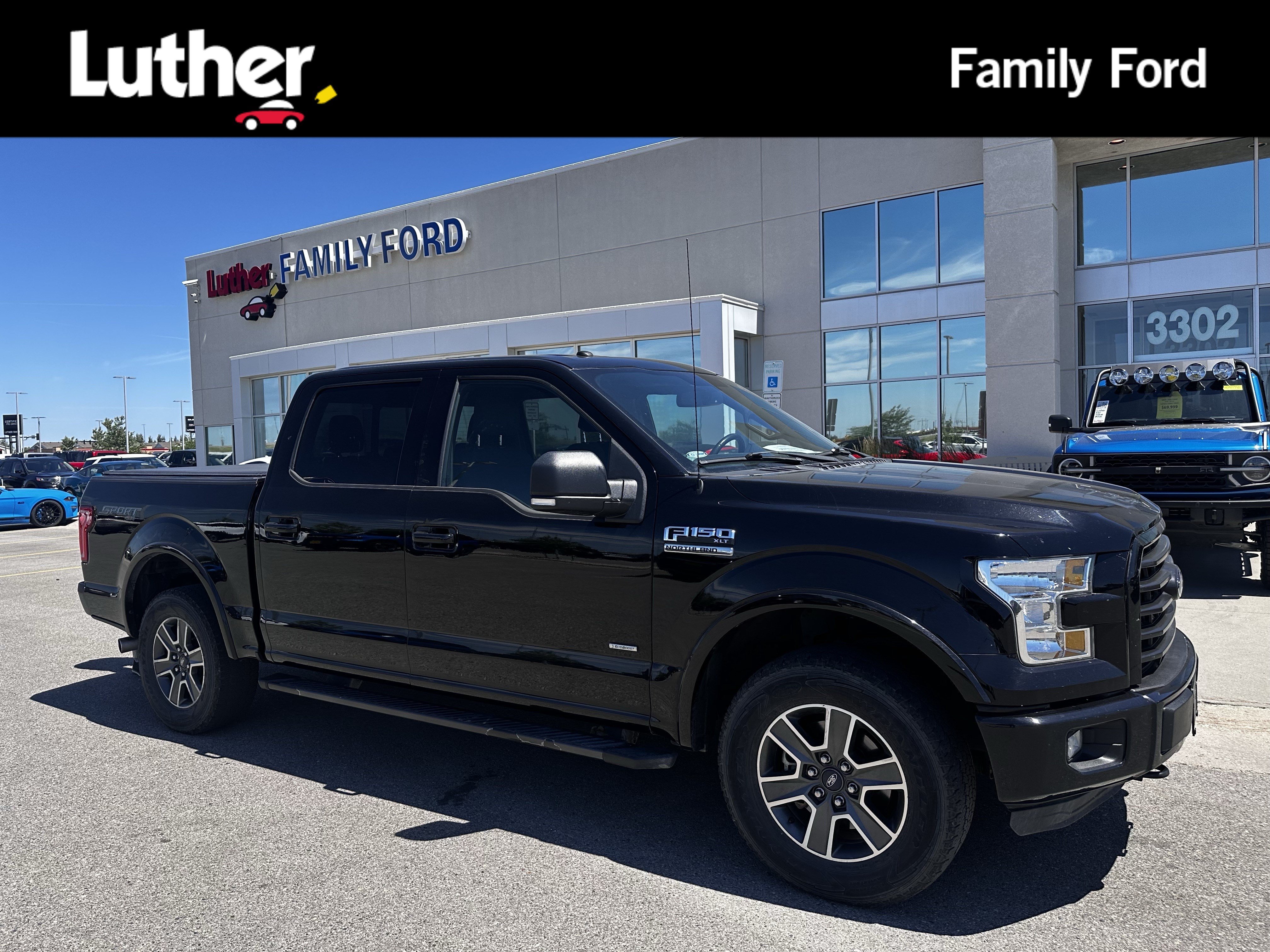 Used 2016 Shadow Black Ford XLT image 1