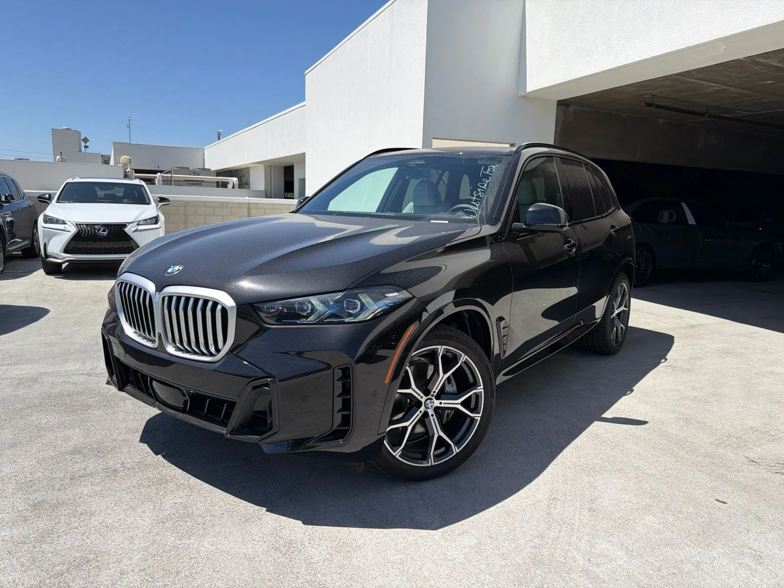 Used 2026 Black Sapphire Metallic BMW xDrive40i image 3