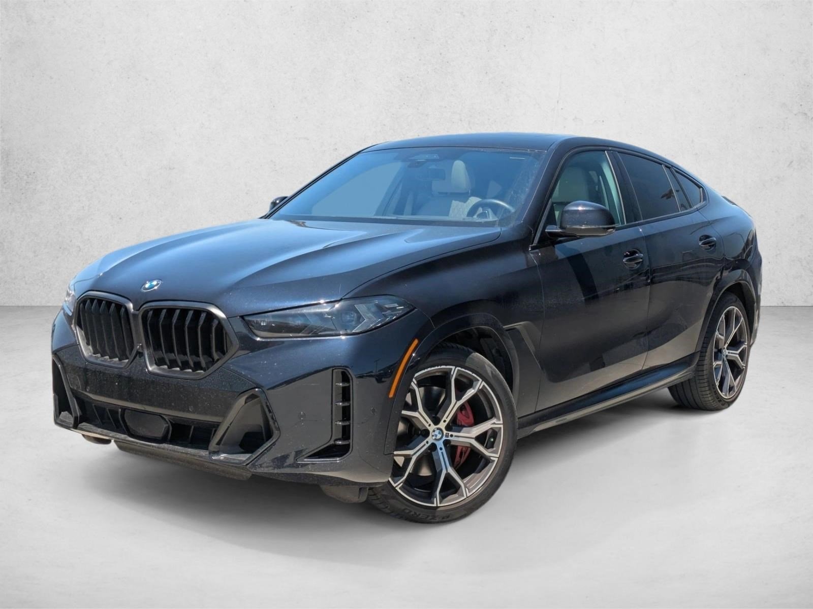 Used 2024 Carbon Black Metallic BMW xDrive40i image 1