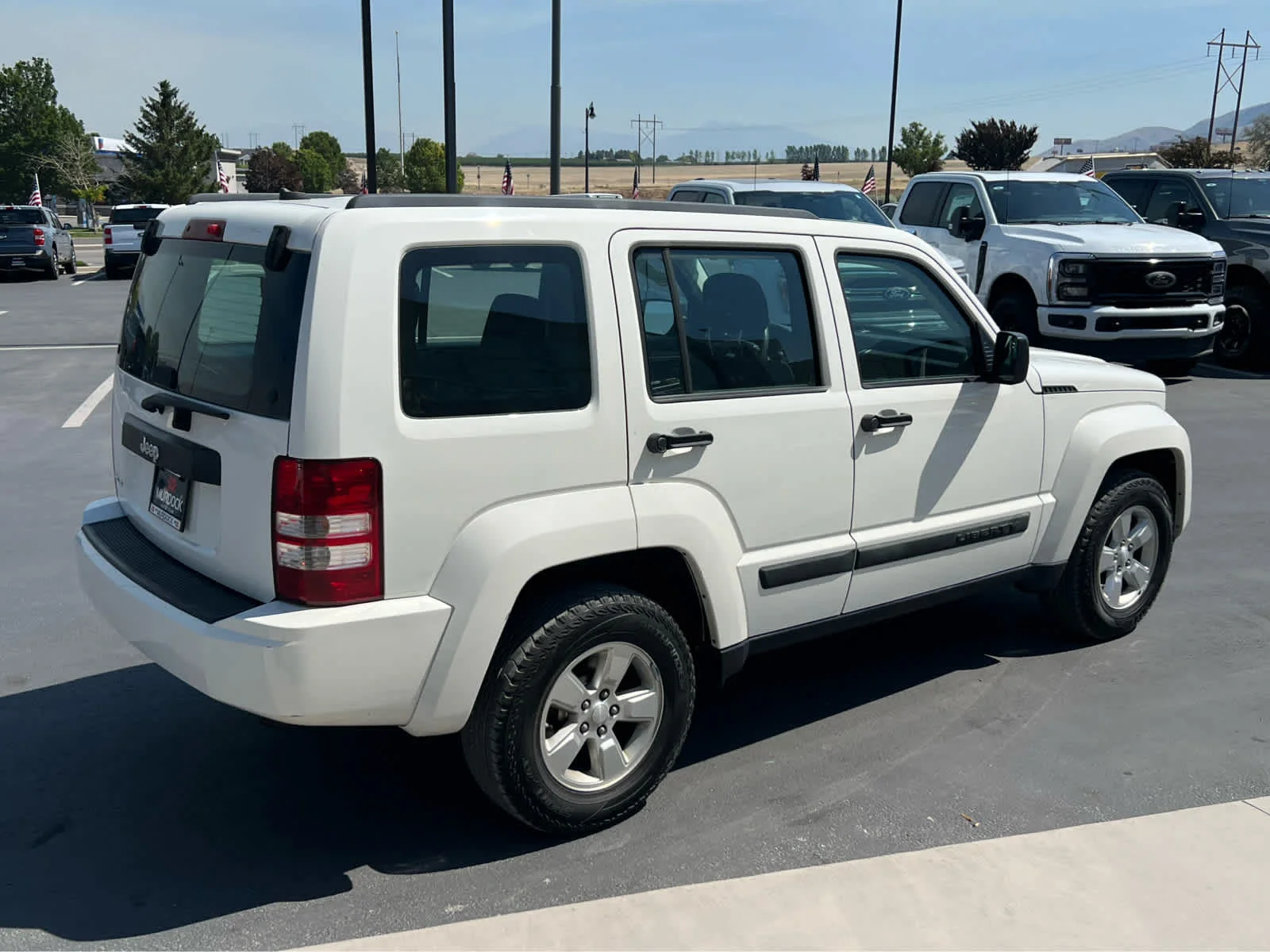 Used 2010 Stone White Clearcoat Jeep Sport image 7