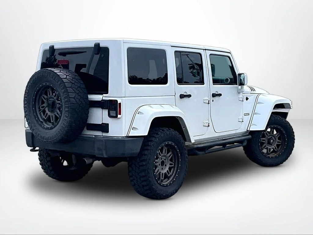 Used 2015 White Jeep Unlimited Sport image 3