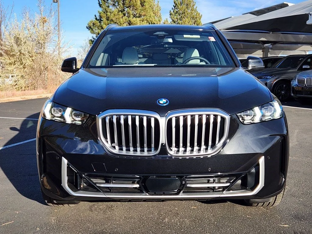 Used 2026 Black Sapphire Metallic BMW xDrive50e image 6
