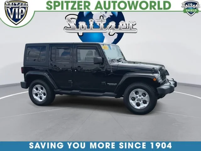 Used 2014 Jeep Wrangler Unlimited Sahara with VIN 1C4BJWEG9EL251961 for sale in Parma, OH