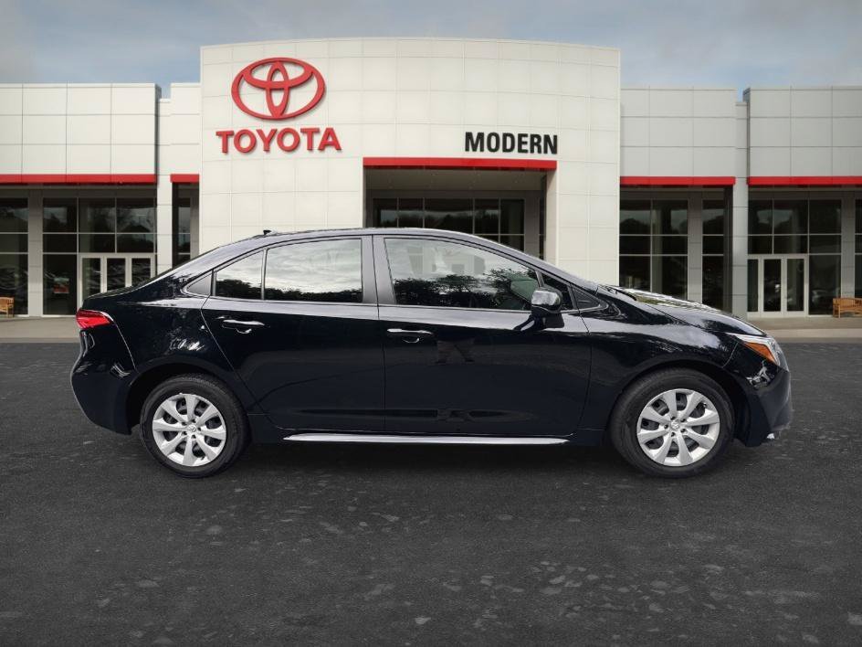 Used 2024 Midnight Black Metallic Toyota Hybrid LE image 4