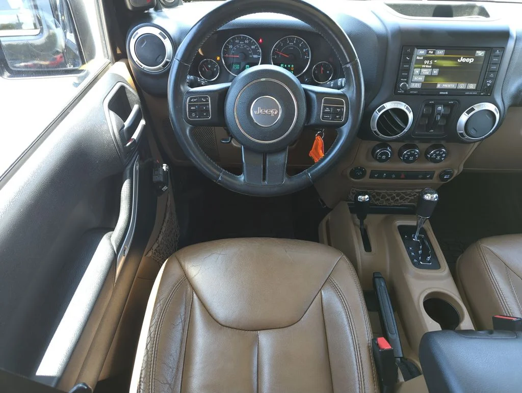 Used 2014 Black Jeep Unlimited Sahara image 14
