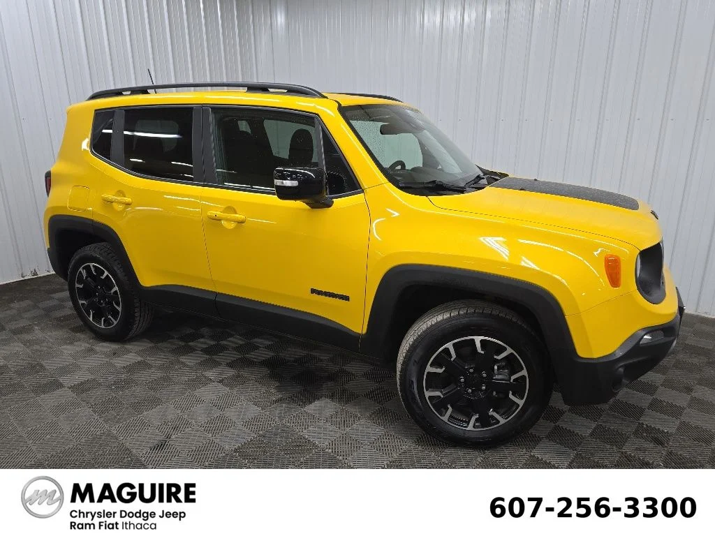 Used 2023 Yellow Jeep Latitude image 1