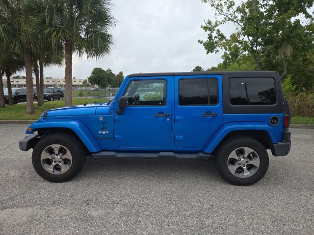 Used 2016 Hydro Blue Pearlcoat Jeep Sahara image 2